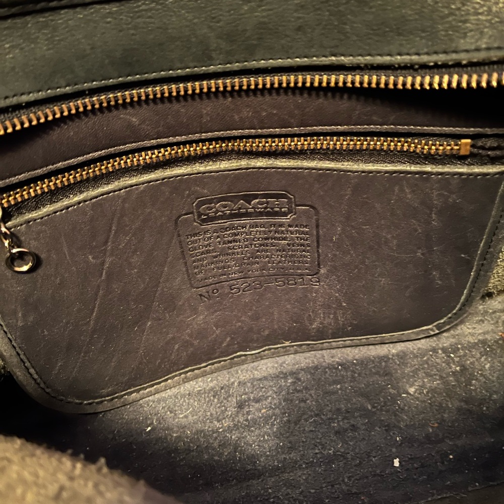 Coach purse in good used condition. Gray leather with strap.